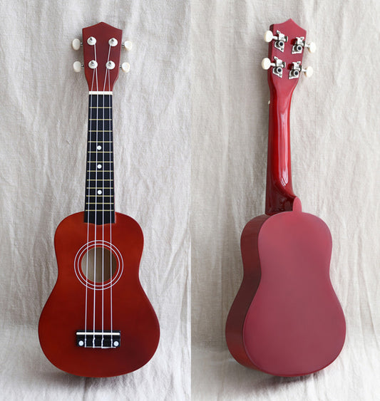 A wooden guitar for children.