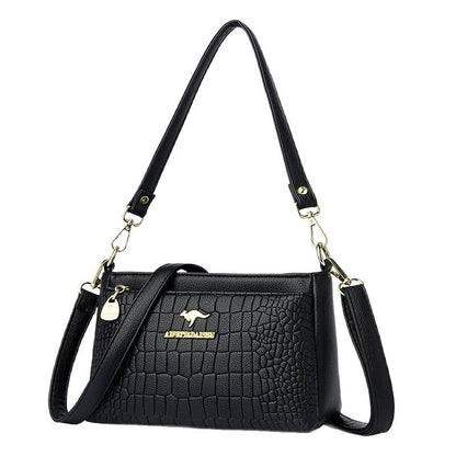 Black textured leather purse for every occasion with adjustable straps by Sheila Merchandise