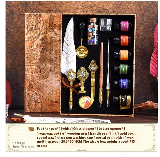 Classical Feather Pen Set by Sheila Merchandise featuring complex mechanical feather pen with ink bottles and letter opener in vintage box