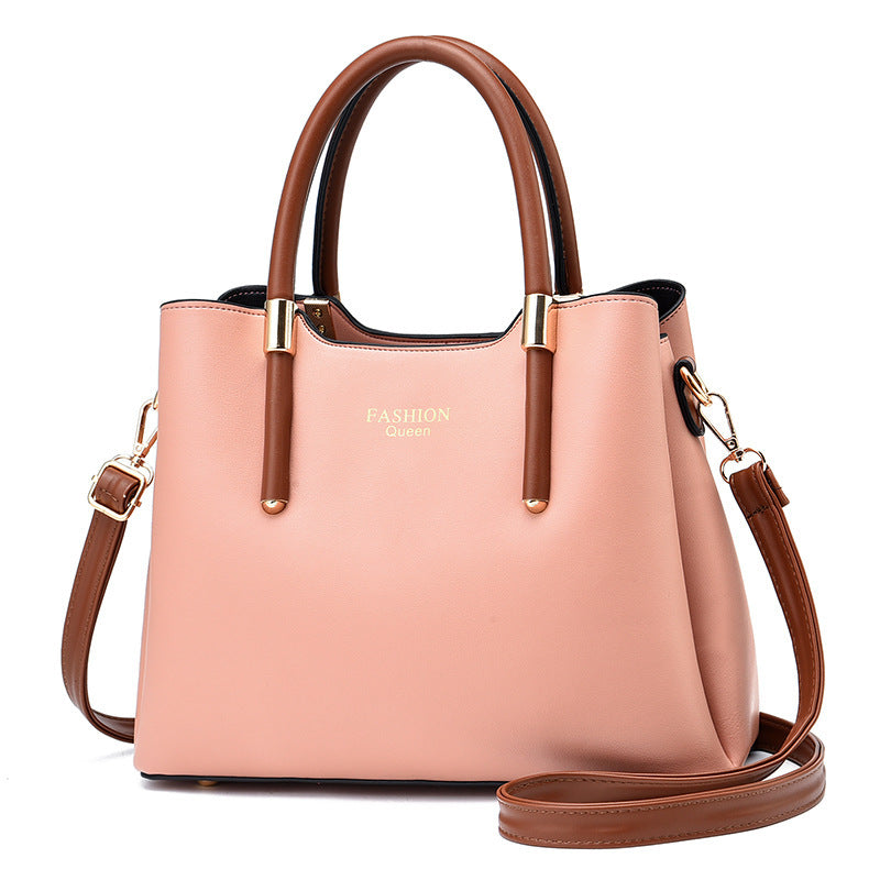 Stylish red handbag with long strap in a soft pink and brown combination for popular big bags
