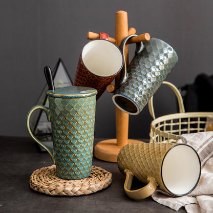 Sheila Merchandise handcrafted ceramic tea mug with vintage textured design in green and brown tones