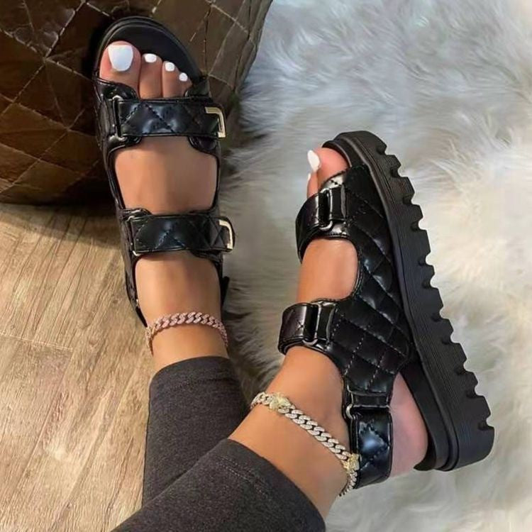 Black quilted platform sandals for every occasion with adjustable buckles and thick soles