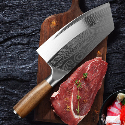 Sheila Merchandise premium stainless steel kitchen knife with wooden handle on cutting board with raw steak