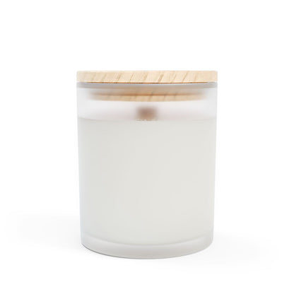 Relaxing lavender candle in a frosted glass jar with a wooden lid for soothing ambiance