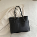 Sheila Merchandise large shoulder bag in black with double handles and stitched detailing