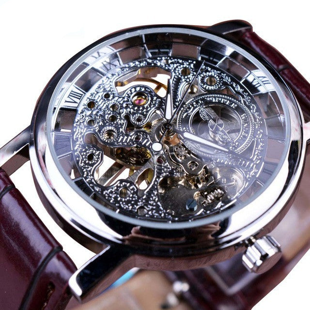 Luxury skeleton watch men's mechanical timepiece with intricate silver gears and brown leather strap