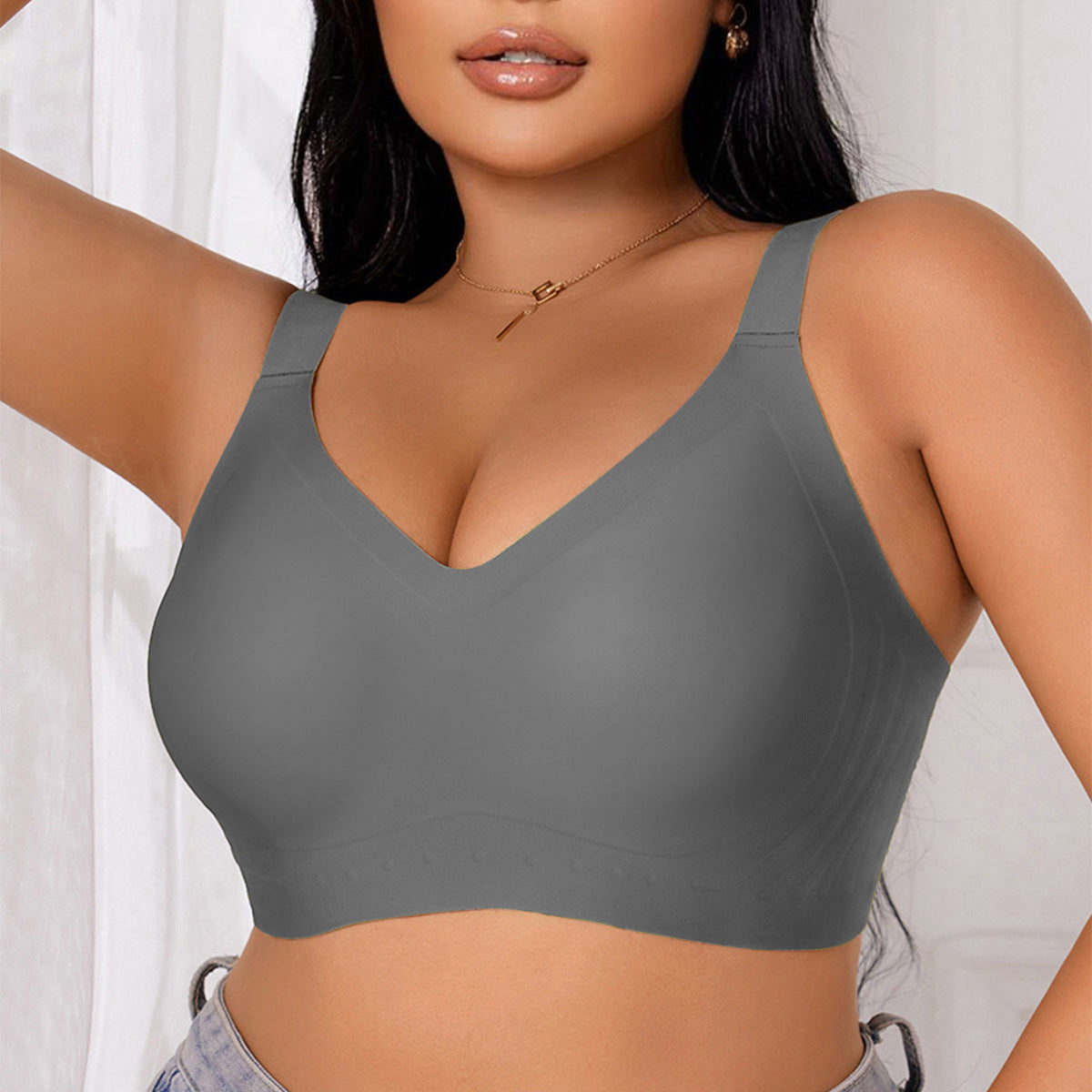 Gray women's seamless sports bra by Sheila Merchandise with wide straps and smooth fabric